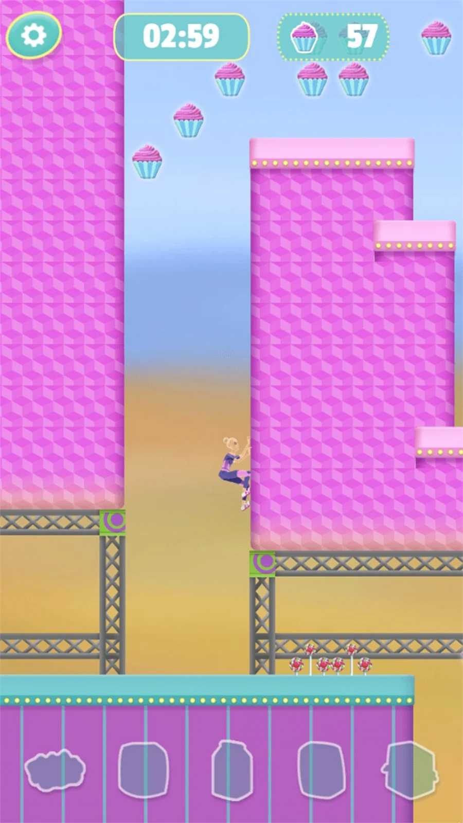 Barbie clinging to the side of a tall pink block tower, cupcakes floating above her, a countdown of 2:59 and a cupcake count of 57 at the top of the screen