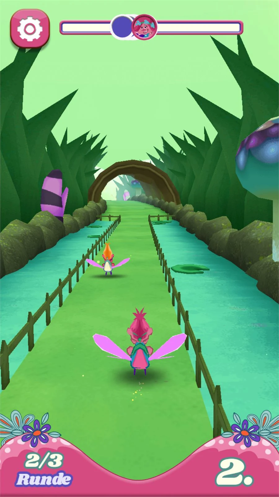 Poppy flying her beetle down a fenced green track towards a stone tunnel, one racer ahead of her, the HUD reading lap two of three and second place